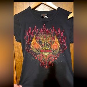 Harley Davidson women’s T-shirt. Size medium. Black knit with graphics.